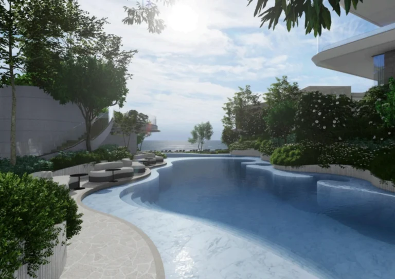Private Beach Club oceanfront lagoon swimming pool at Soondri Wongamat luxury condo Pattaya